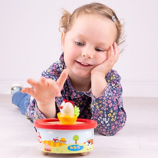 Bigjigs Toys Cutie muzicală din lemn fermă